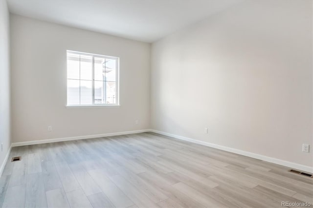 empty room featuring light wood-type flooring