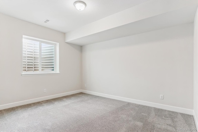 view of carpeted spare room