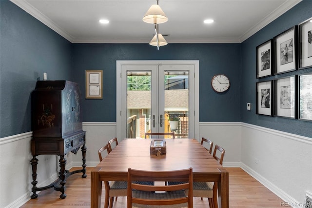 1265 S Elizabeth St, Denver, CO 80210 - dining area featuring light wood-type flooring, french doors, crown molding, and recessed lighting