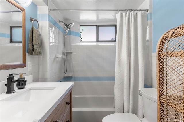 1265 S Elizabeth St, Denver, CO 80210 - bathroom with tile walls, vanity, and shower / bath combination with curtain