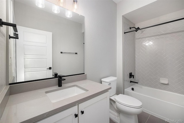 full bathroom featuring tile patterned floors, shower / bathtub combination, toilet, and vanity