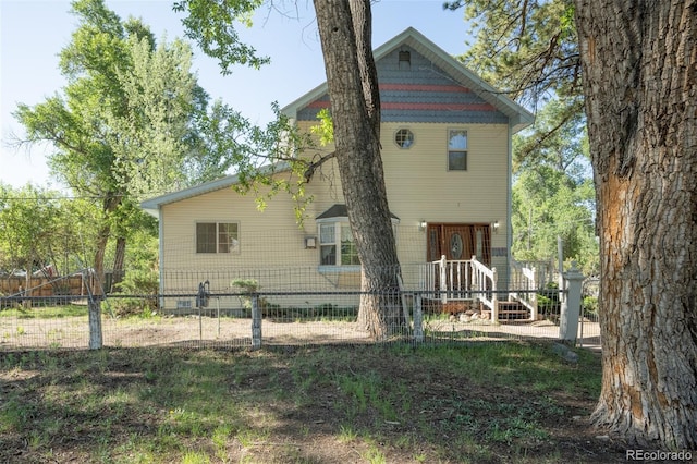 319 W Arkansas St, Buena Vista, CO 81211 - rear view of property with a fenced front yard