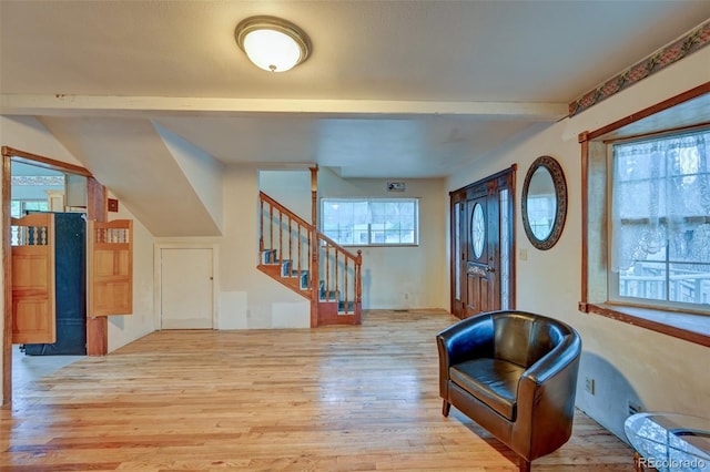 319 W Arkansas St, Buena Vista, CO 81211 - foyer featuring wood finished floors, stairway, and beamed ceiling