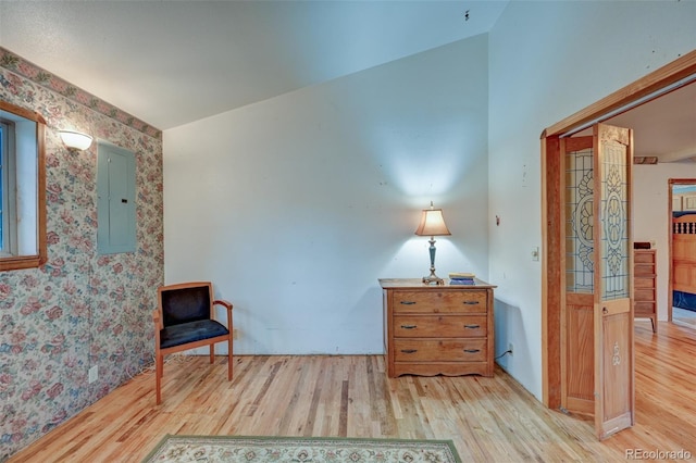 319 W Arkansas St, Buena Vista, CO 81211 - sitting room featuring electric panel, light wood finished floors, and wallpapered walls