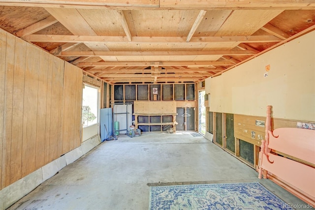 319 W Arkansas St, Buena Vista, CO 81211 - basement featuring wooden walls and freestanding refrigerator
