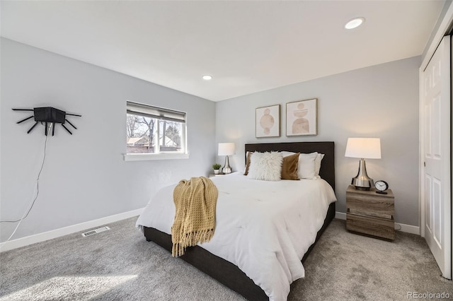 bedroom with recessed lighting, a closet, carpet, and baseboards