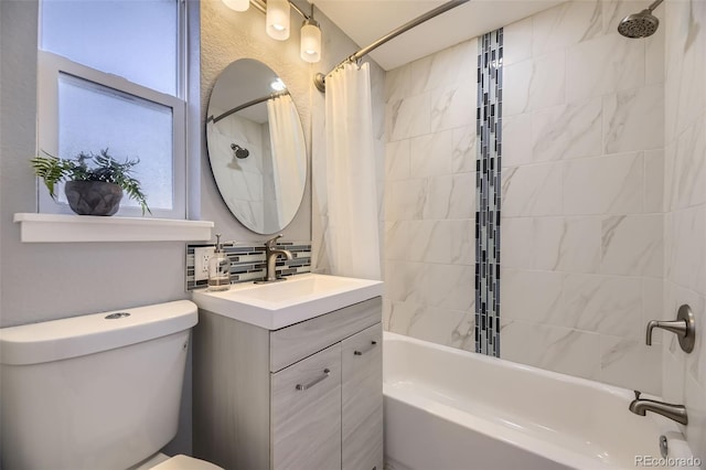 bathroom featuring tasteful backsplash, vanity, toilet, and shower / bathtub combination with curtain