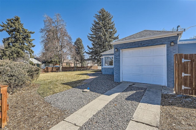 garage with fence