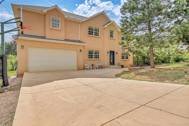 view of front of home with a garage