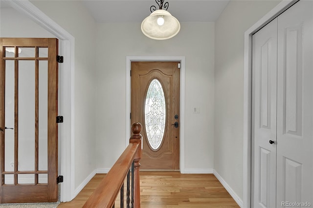 entrance foyer with light wood-type flooring