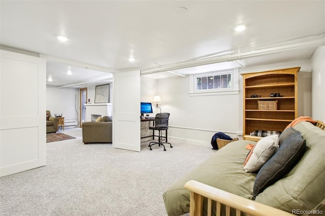 carpeted living area with baseboards, baseboard heating, and recessed lighting