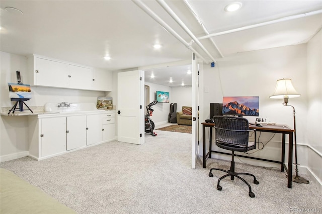 home office with recessed lighting, baseboards, and light carpet
