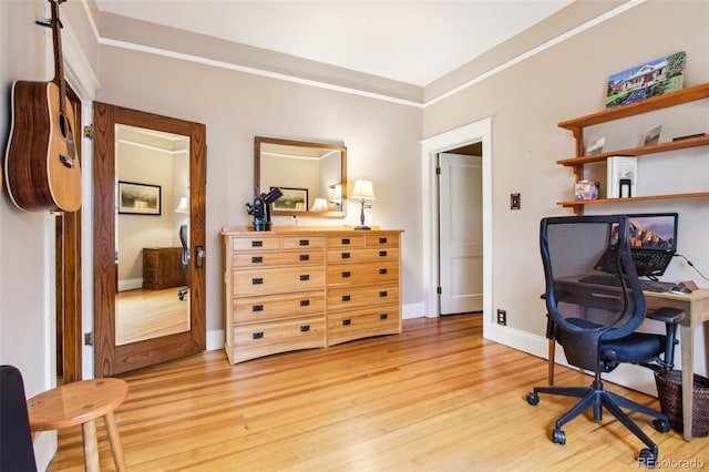 4253 Hooker St, Denver, CO 80211 - office area with light wood-style floors, ornamental molding, and baseboards