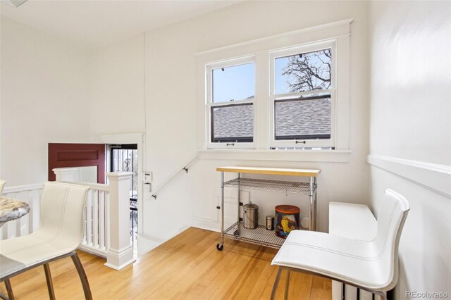 4253 Hooker St, Denver, CO 80211 - living area featuring wood finished floors and an upstairs landing