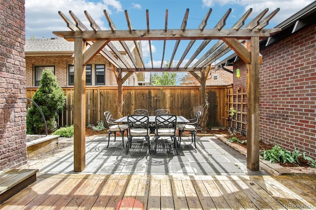 4253 Hooker St, Denver, CO 80211 - wooden terrace with a pergola, outdoor dining area, and a fenced backyard