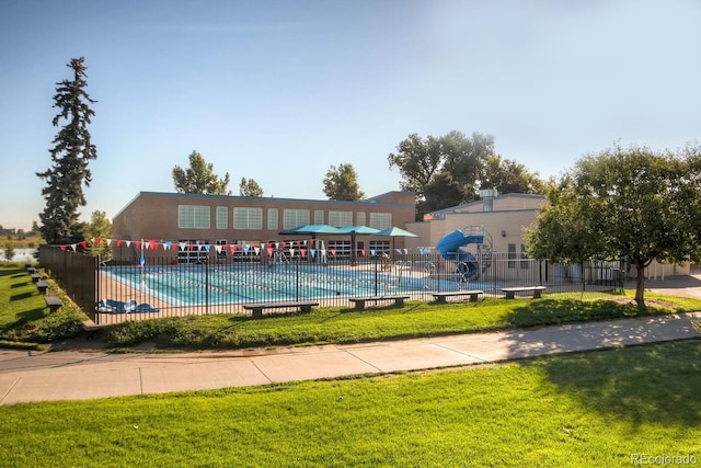 4253 Hooker St, Denver, CO 80211 - community pool featuring a yard, fence, and a water slide