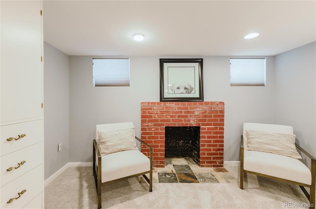 sitting room with a fireplace