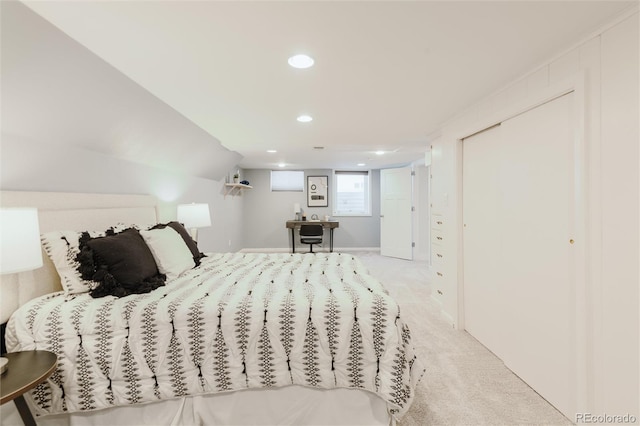 carpeted bedroom featuring vaulted ceiling