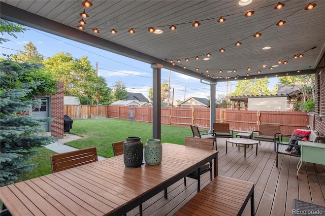 deck featuring a lawn