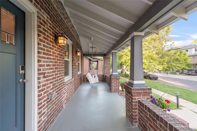 view of patio featuring covered porch