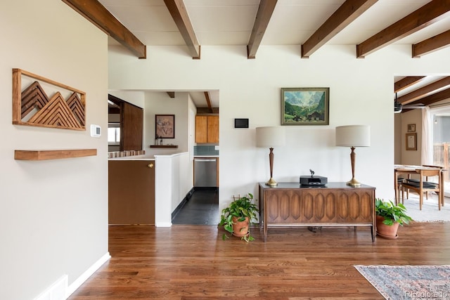 7820 Grove St, Westminster, CO 80030 - living area featuring dark wood-style flooring, beamed ceiling, and a ceiling fan