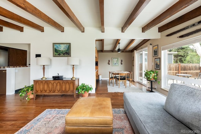 7820 Grove St, Westminster, CO 80030 - living area with dark wood-style floors, beamed ceiling, and a ceiling fan
