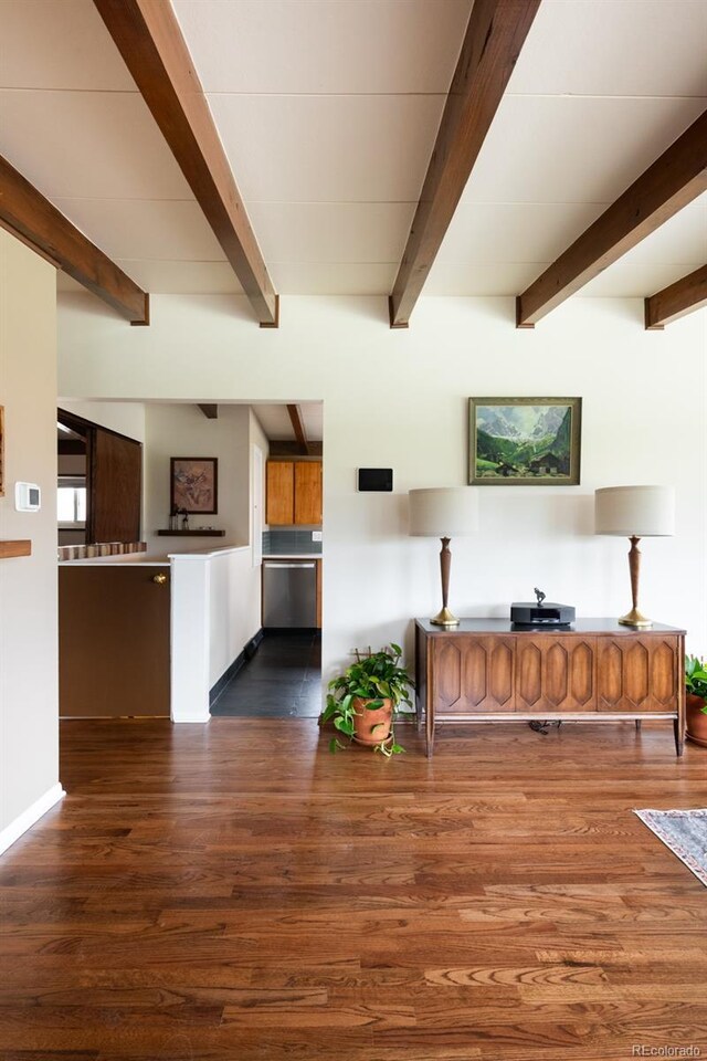 7820 Grove St, Westminster, CO 80030 - living area with dark wood-type flooring and beam ceiling