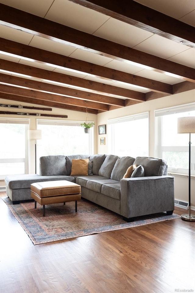 7820 Grove St, Westminster, CO 80030 - living room featuring beam ceiling and wood finished floors