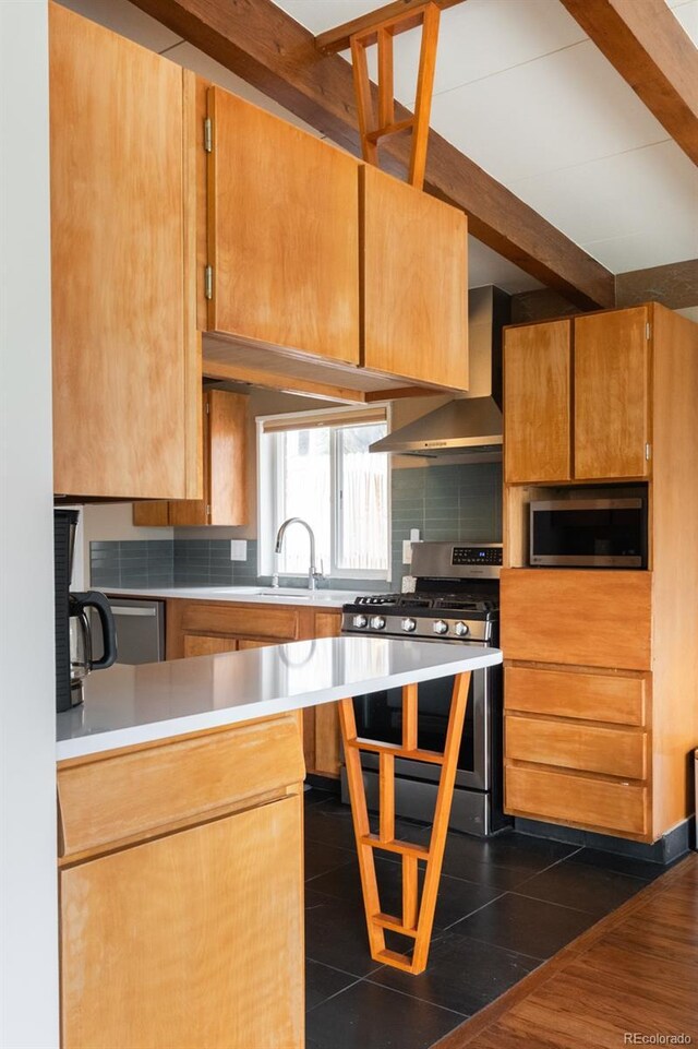 7820 Grove St, Westminster, CO 80030 - kitchen featuring appliances with stainless steel finishes, beam ceiling, decorative backsplash, light countertops, and custom range hood