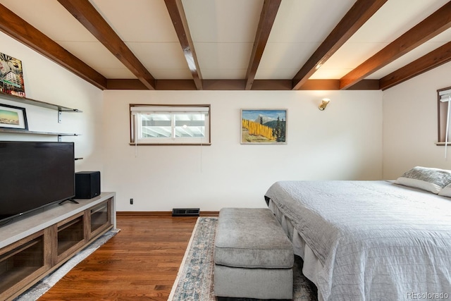 7820 Grove St, Westminster, CO 80030 - bedroom featuring dark wood-style floors and beam ceiling