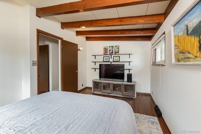 7820 Grove St, Westminster, CO 80030 - bedroom with wood finished floors and beam ceiling