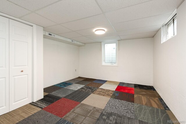 7820 Grove St, Westminster, CO 80030 - below grade area featuring a paneled ceiling and plenty of natural light