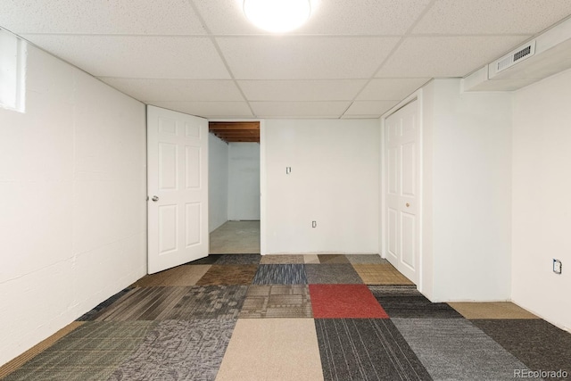 7820 Grove St, Westminster, CO 80030 - finished below grade area with a paneled ceiling and carpet floors