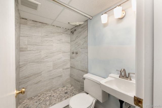7820 Grove St, Westminster, CO 80030 - full bath with a drop ceiling and a tile shower