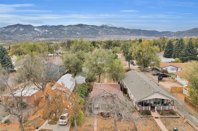 birds eye view of property featuring a mountain view