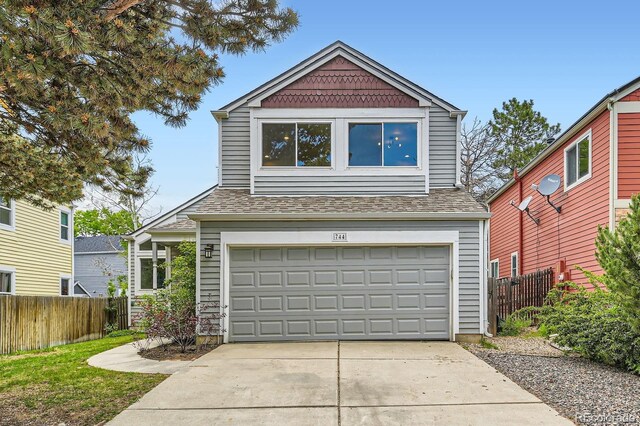 744 Owl Dr, Louisville, CO 80027 - traditional home featuring an attached garage and driveway