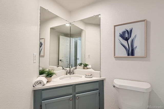 744 Owl Dr, Louisville, CO 80027 - half bathroom featuring toilet and vanity