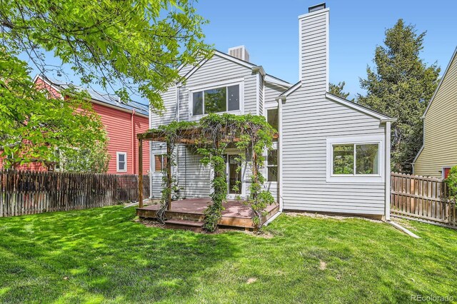 744 Owl Dr, Louisville, CO 80027 - back of house with a chimney and a deck