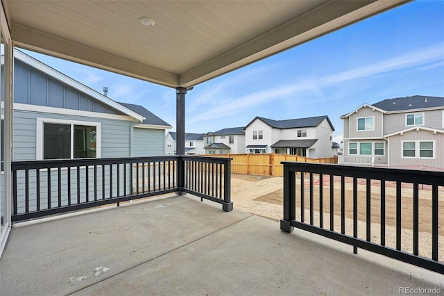 view of patio / terrace with a residential view and a fenced backyard