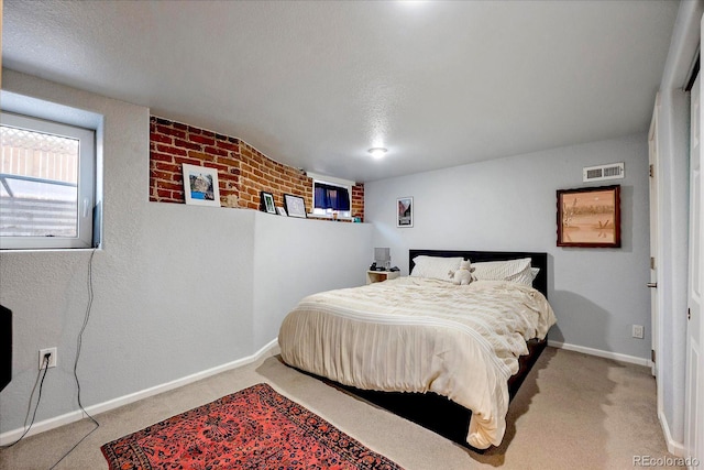 carpeted bedroom with baseboards and visible vents