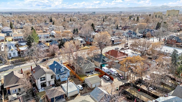 aerial view featuring a mountain view and a residential view