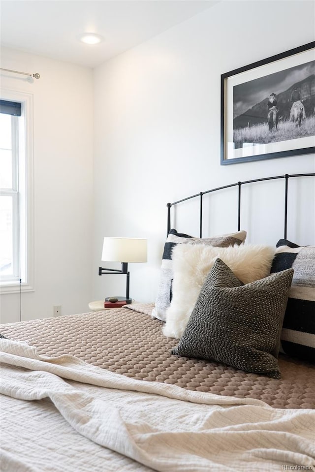 4395 E Jewell Ave Unit 3, Denver, CO 80222 - bedroom featuring multiple windows
