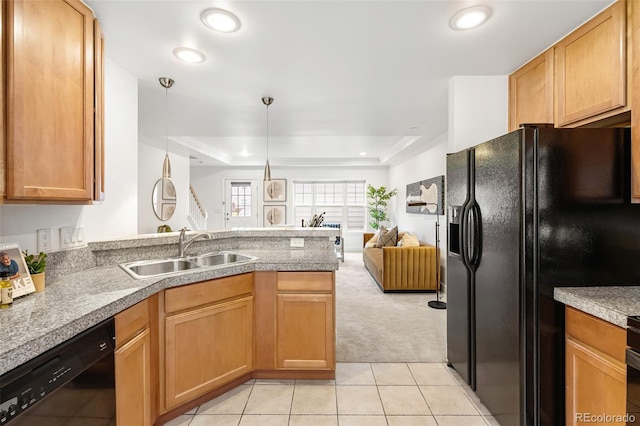 4395 E Jewell Ave Unit 3, Denver, CO 80222 - kitchen with black appliances, light carpet, a peninsula, light tile patterned flooring, and open floor plan