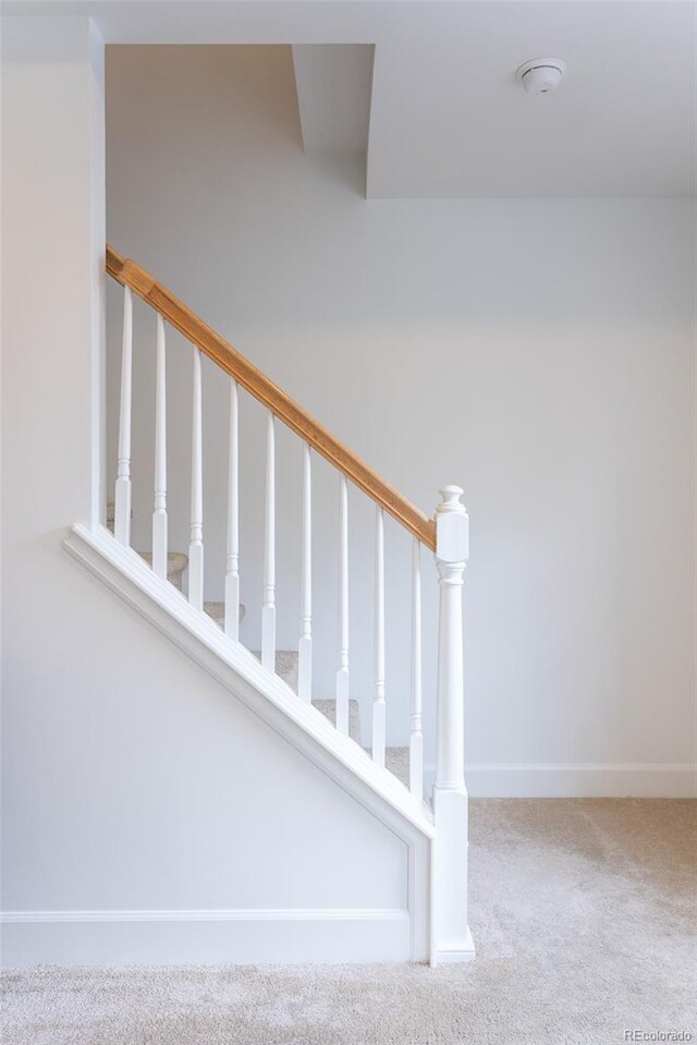4395 E Jewell Ave Unit 3, Denver, CO 80222 - staircase with carpet and baseboards