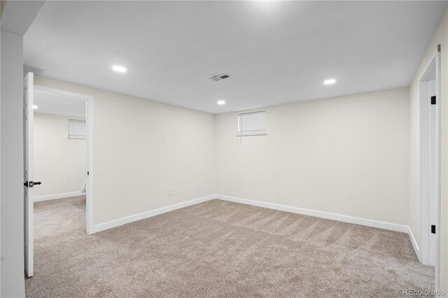 basement with light carpet