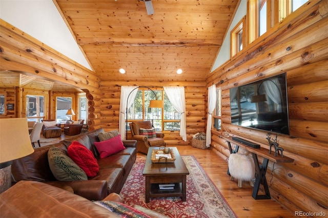 living room featuring light wood-type flooring, high vaulted ceiling, and wooden ceiling