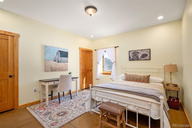 bedroom with recessed lighting and baseboards