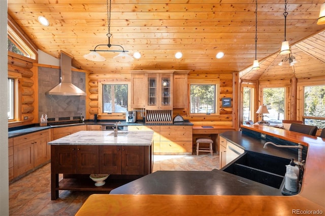 kitchen with ventilation hood, cooktop, wood ceiling, an island with sink, and lofted ceiling