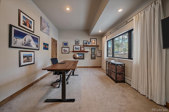 office space featuring a baseboard radiator, light colored carpet, baseboards, and recessed lighting