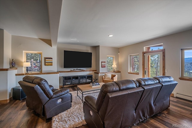 living area with recessed lighting, dark wood-style flooring, a baseboard radiator, and baseboards